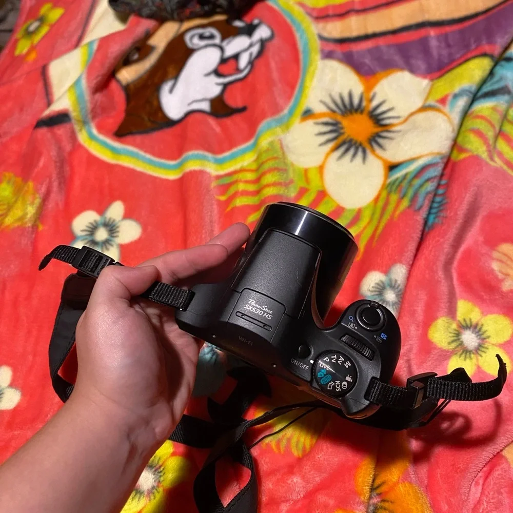 Canon Black Digital Camera with Strap
